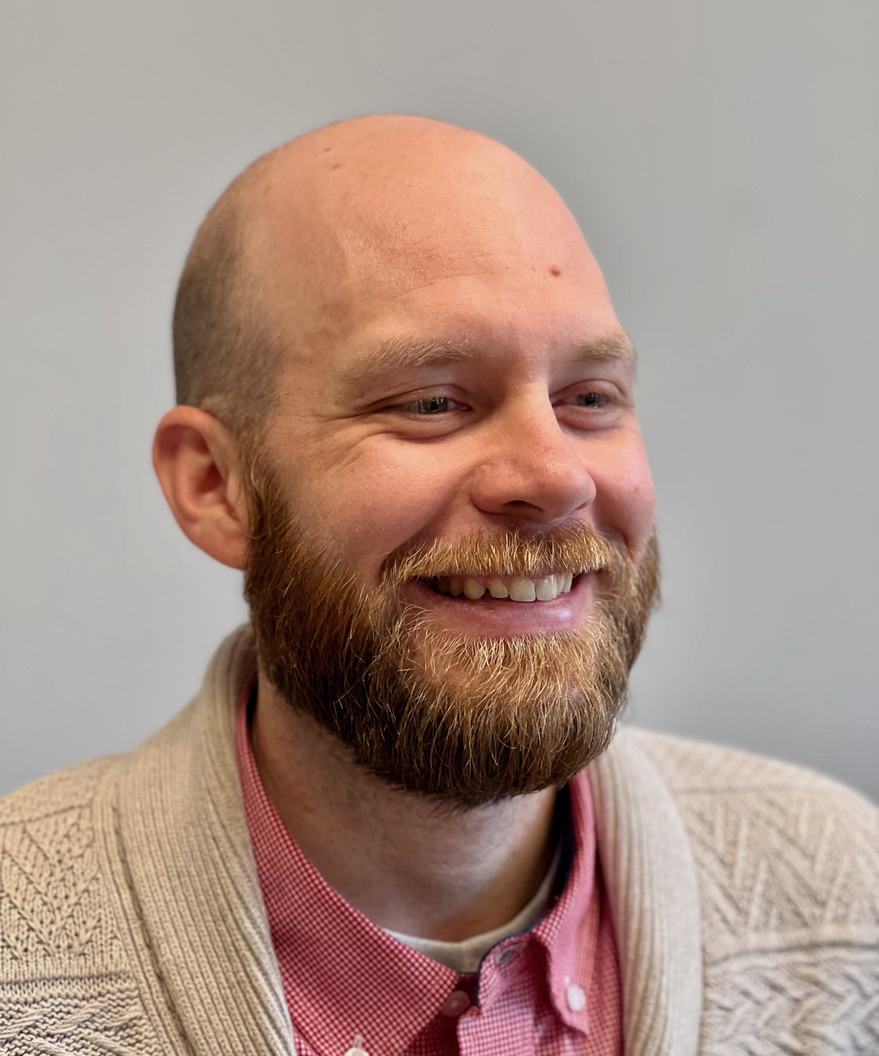 Sean Dulin headshot with light gray background